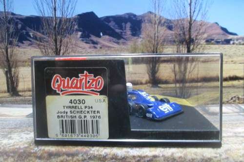 QUARTZO  NO 4030  -  TYRRELL P34  ` JODY SCHECKTER ` BRITISH  G.P. 1976  MINT IN DISPLAY CASE