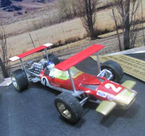 QUARTZO  NO 4011  -  LOTUS 49B  ` J . RINDT  ` - SOUTH AFRICAN  G.P. 1969  MINT IN DISPLAY CASE