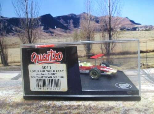 QUARTZO  NO 4011  -  LOTUS 49B  ` J . RINDT  ` - SOUTH AFRICAN  G.P. 1969  MINT IN DISPLAY CASE