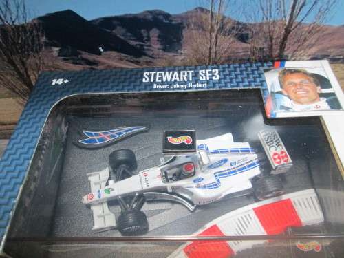 STUNNING HOT WHEELS  NO 24624  1999  STEWART  SF3  ` J . HERBERT  ` MINT -  BOXED WITH  DISPLAY CASE