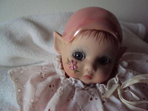 Hand crafted MOP pink Flower Pixie porcelain doll, pink flower outfit