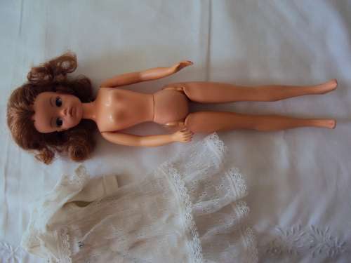 Vintage Hong Kong Sindy in white lace dress twist waist, bend legs,  tilting head 29cm tall