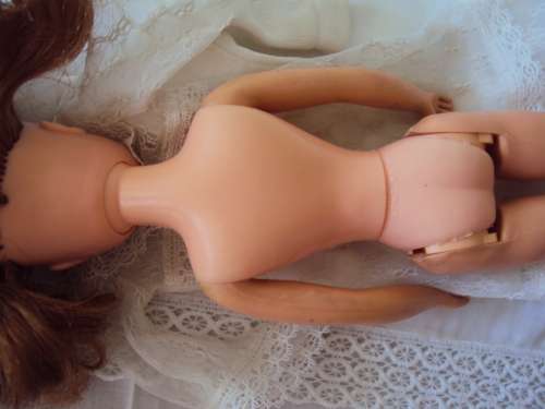 Vintage Hong Kong Sindy in white lace dress twist waist, bend legs,  tilting head 29cm tall