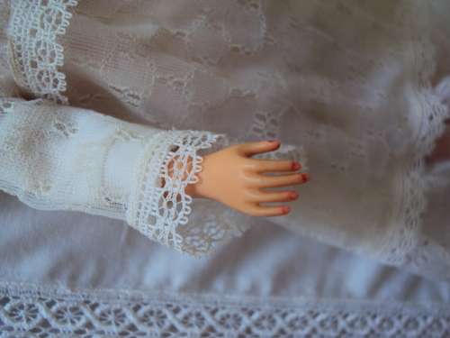 Vintage Hong Kong Sindy in white lace dress twist waist, bend legs,  tilting head 29cm tall