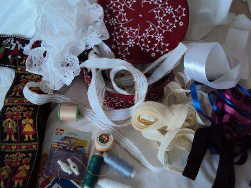 A Lovely  Pretty Red Tin filled with sewing delights - lace ribbon cotton + more
