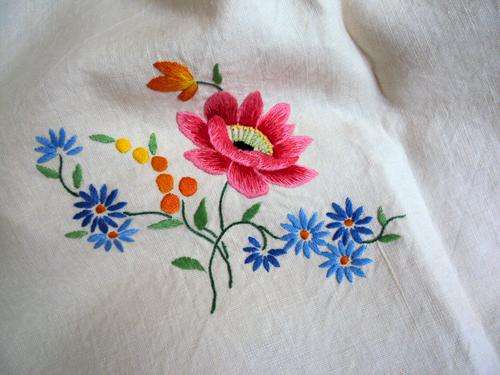 Hand embroidered Summer flowers cotton tablecloth edged in crochet lace