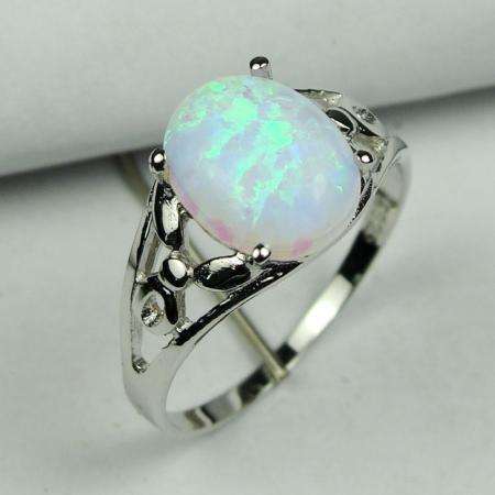 MARYKAY - GORGEOUS  WHITE  FIRE OPAL SET IN STERLING SLVER RING SIZE 7/O