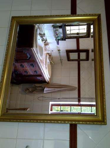 Large Mirror with beveled edge and gold frame
