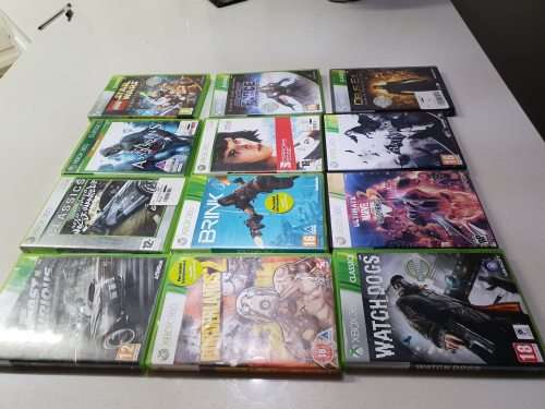 XBox 360 S 4gig, with 2 wireless remotes and 28 games