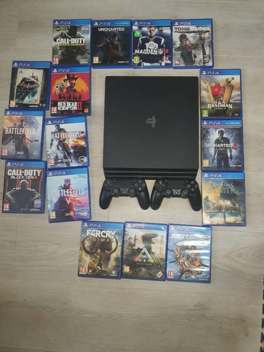 Playstation 4 with remotes and games