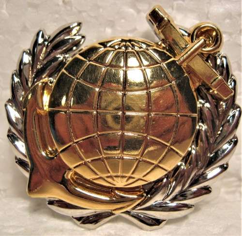 S.A. MARITIME REACTION/MARINES BREAST BADGE WITH PINS AND CAPS IN AN UNUSED CONDITION