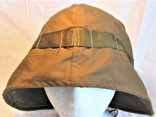 OLD SADF NUTRIA HELMET COVER SIZE MEDIUM WITH A FEW SCRATCHES ON THE TOP OTHERWISE GOOD CONDITION