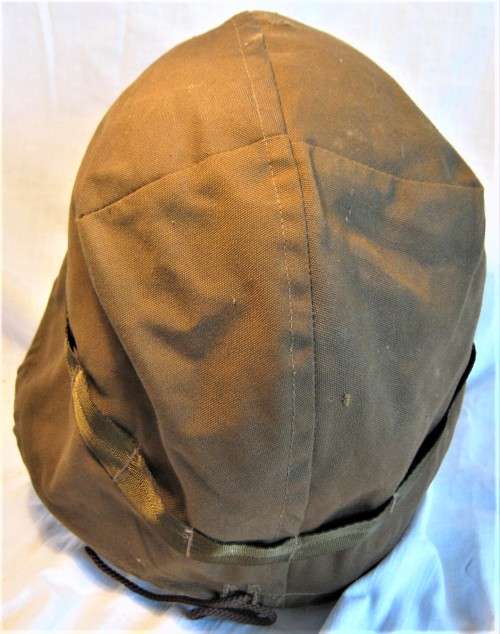 OLD SADF NUTRIA HELMET COVER SIZE MEDIUM WITH A FEW SCRATCHES ON THE TOP OTHERWISE GOOD CONDITION