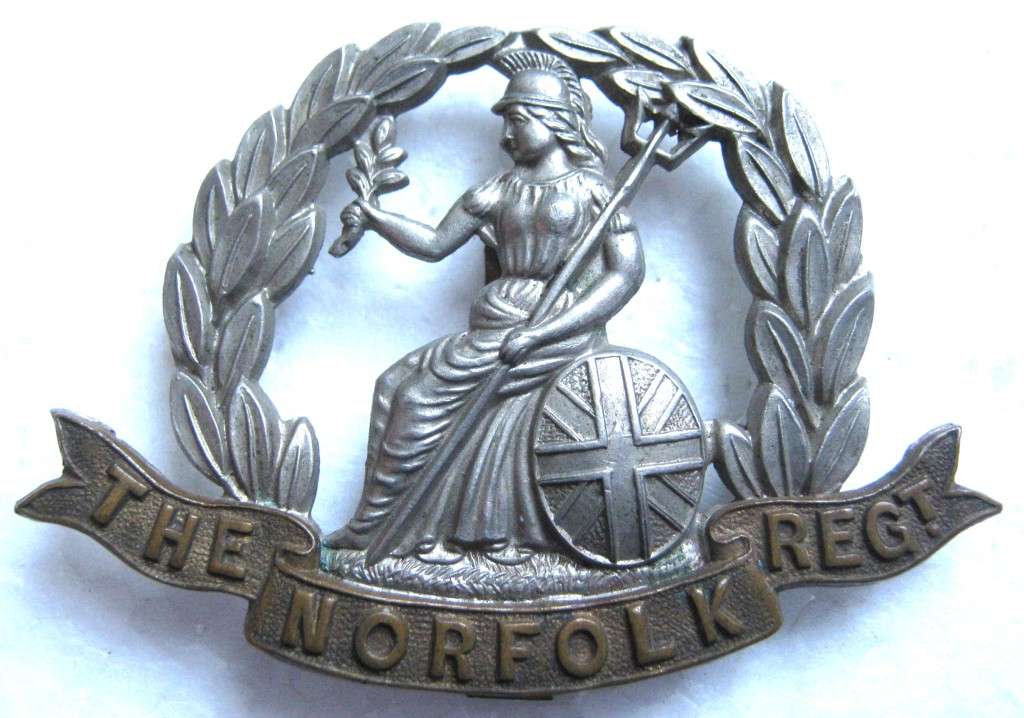WW1 THE NORFOLK REGIMENT CAP BADGE WITH SLIDE IN VERY GOOD CONDITION