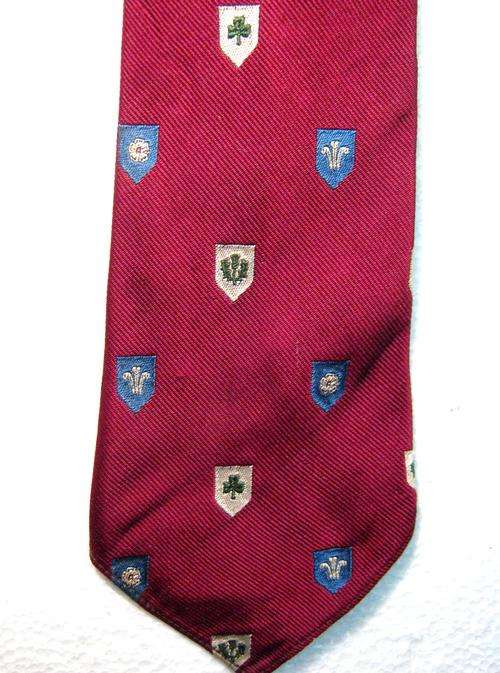 VERY OLD RUGBY TIE DEPICTING THE 4 BRITISH HOME UNION SIDES - MAYBE WHEN THE FRENCH WERE EXPELLED