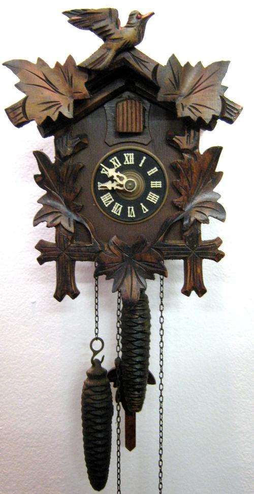 SMALL AUGUST SCHWER CUCKOO CLOCK - WORKING BUT DOES NOT CUCKOO - BELLOWS GOOD
