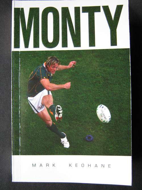 "MONTY" BOOK SIGNED BY PERCY MONTGOMERY AND MARK KEOHANE
