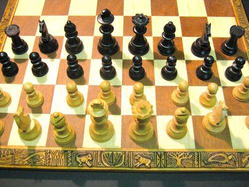 VINTAGE WOODEN CHESS SET WITH BOARD - Board is new and chess set in good condition
