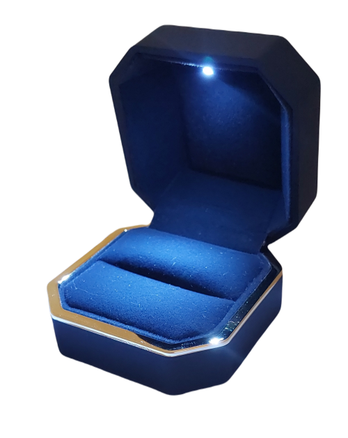 Ring box with light lined with velvet
