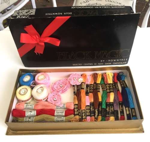 Vintage Black Magic box with embroidery thread