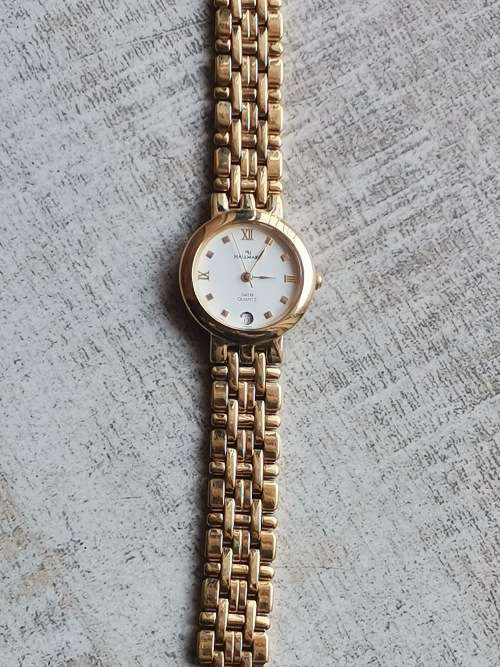 HALLMARK LADIES GOLD PLATED WATCH IN EXCELLENT WORKING CONDITION AS GOOD AS NEW
