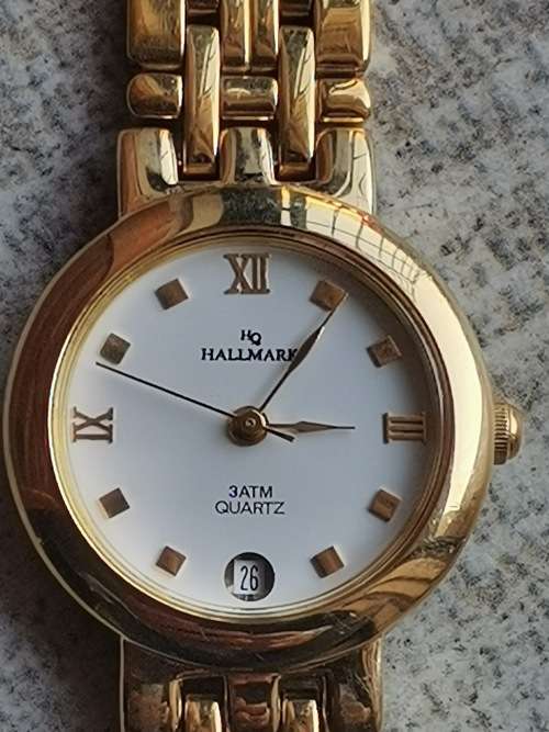 HALLMARK LADIES GOLD PLATED WATCH IN EXCELLENT WORKING CONDITION AS GOOD AS NEW