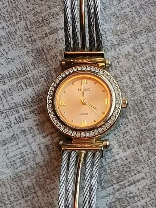 LADIES GOLD PLATED LANCO WATCH WITH CABLE STRAP IN EXCELLENT WORKING CONDITION VALUED @ R1200