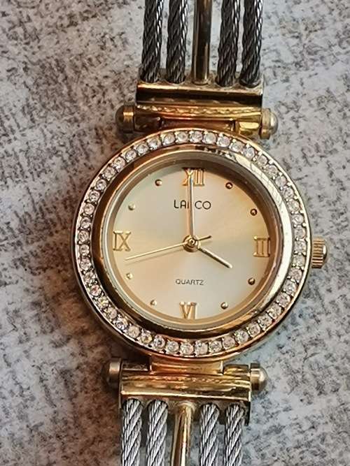 LADIES GOLD PLATED LANCO WATCH WITH CABLE STRAP IN EXCELLENT WORKING CONDITION VALUED @ R1200