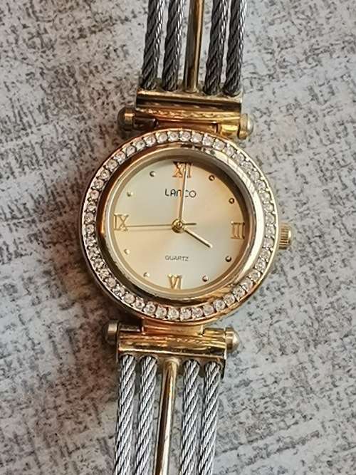 LADIES GOLD PLATED LANCO WATCH WITH CABLE STRAP IN EXCELLENT WORKING CONDITION VALUED @ R1200