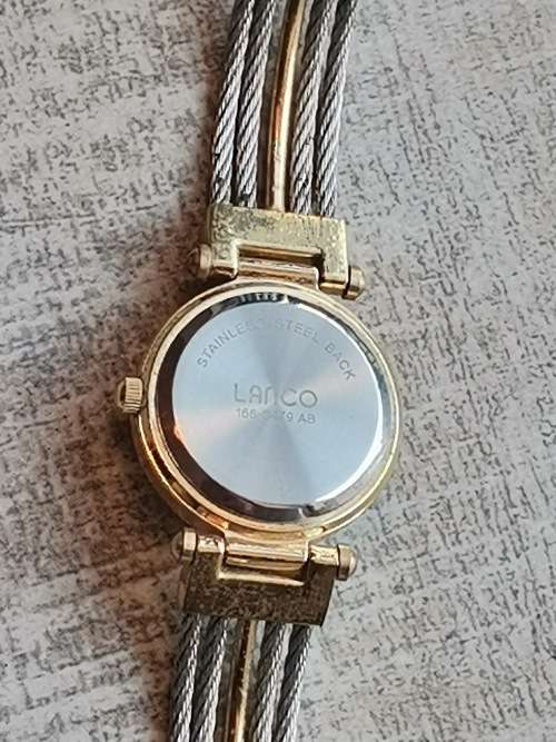 LADIES GOLD PLATED LANCO WATCH WITH CABLE STRAP IN EXCELLENT WORKING CONDITION VALUED @ R1200