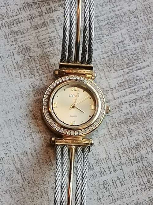 LADIES GOLD PLATED LANCO WATCH WITH CABLE STRAP IN EXCELLENT WORKING CONDITION VALUED @ R1200