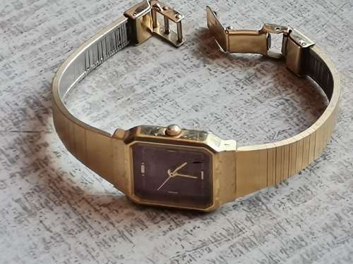 SAMSUNG GOLD PLATED SWISS WATCH IN EXCELLENT WORKING CONDITION