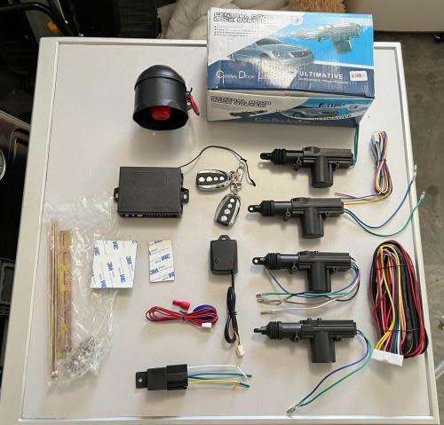 CAR ALARM AND CENTRAL LOCKING SYSTEM WITH MANUALS NEW IN BOX
