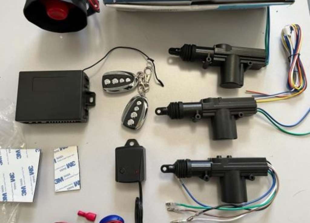 CAR ALARM AND CENTRAL LOCKING SYSTEM WITH MANUALS NEW IN BOX