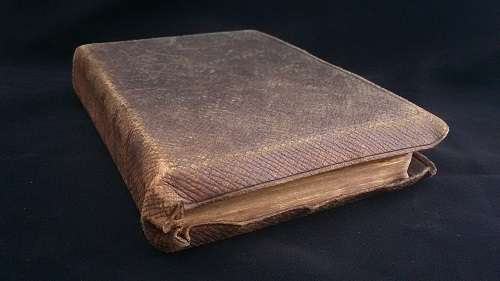 100 year old Bible, leather bound and sewn with silk (dated 1917) with gilt edged pages