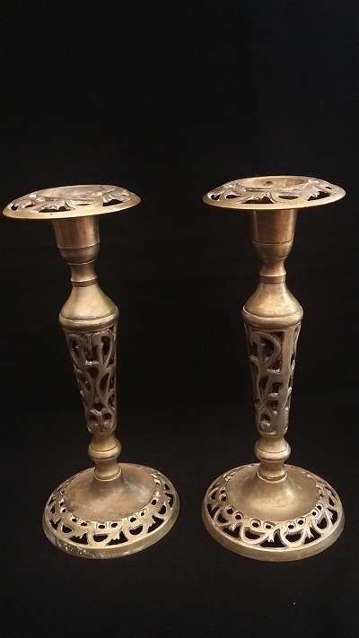 Stunning pair of candlesticks with beautiful detail.  One Bid