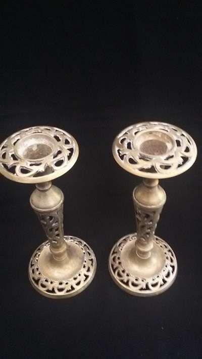 Stunning pair of candlesticks with beautiful detail.  One Bid
