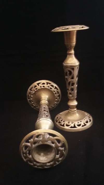 Stunning pair of candlesticks with beautiful detail.  One Bid