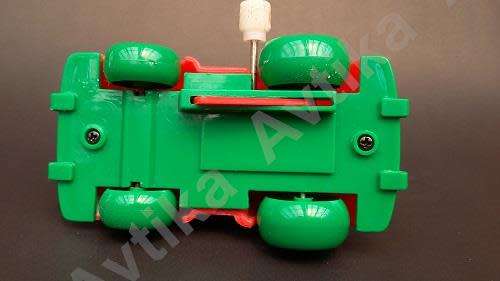 Cute little windup father christmas in his car - working