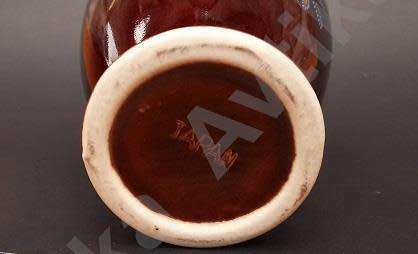 Beautil oriental vase made in Japan.  Floral design with gilt accents.  No chips or cracks