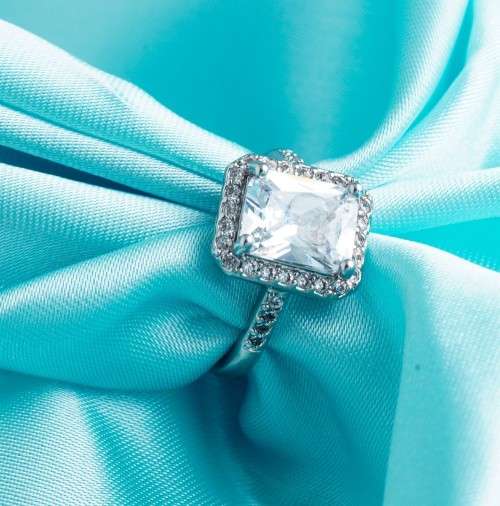 Incredible 3.79 Carat (TW)  Radiant Cut Sim. Diamond Halo Ring. Size 8/P