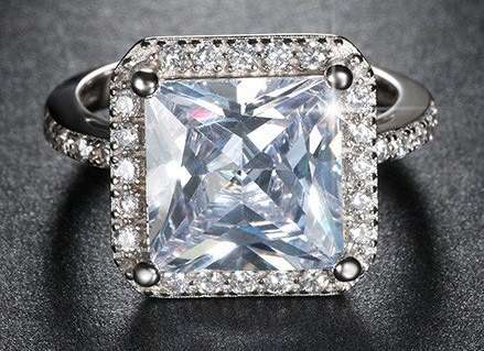 Amazing 4 carat Princess cut Simulated Diamond Ring. Sizes 5,6,7,8,9 mobicred available