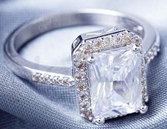 Incredible 3.79 Carat (TW) Radiant Cut Halo Ring. Size 8.