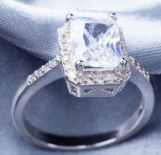 Incredible 3.79 Carat (TW) Radiant Cut Halo Ring. Size 8.