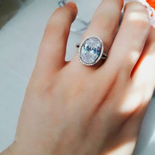 6 CARAT Oval cut Split Shank Simulated Diamond Halo Ring. Size 6. Click to see Stone used