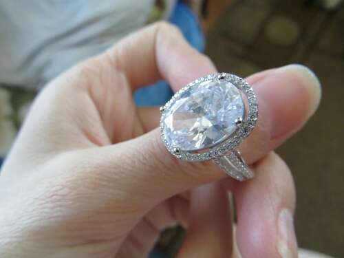 Magnificent 6 CARAT Oval cut Split Shank Simulated Diamond Halo Ring. Size 6