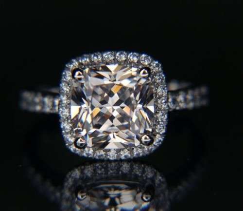 3.02 Carat Cr. Diamond Cushion cut Halo Engagement Ring. Size 7/O. See stone used
