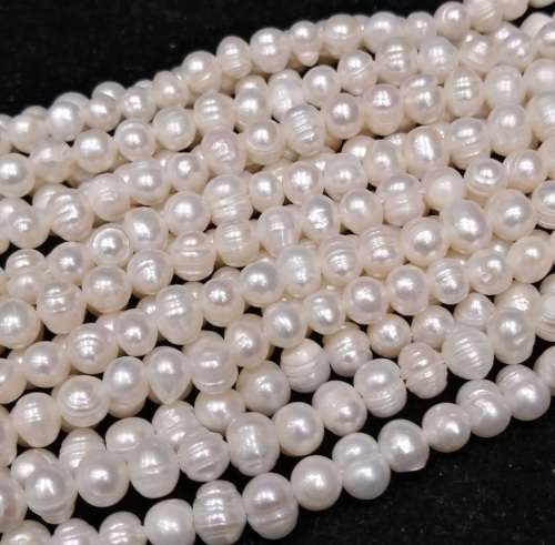 Natural FRESHWATER PEARLS 5-8mm +-35cm