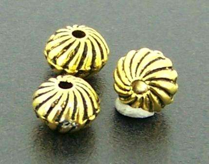 6mm x 5mm Metal / gold plated round swirl spacer bead - sold individually