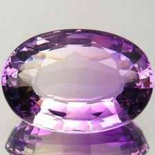 Such a gorgeous gem! 22.46 cts Natural BI-COLOUR AMETHYST oval facet (Bolivia)